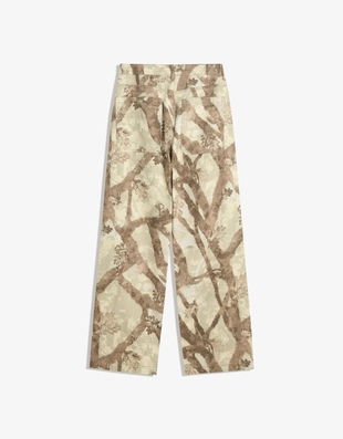 Джинсы свободного кроя с принтом- Заказать в России