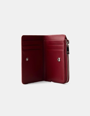 Кошелек из искусственной лакированной кожи с тиснением- Заказать в России