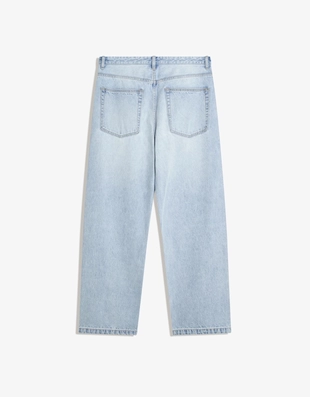 Джинсы свободного кроя с декоративными заклепками- Заказать в России