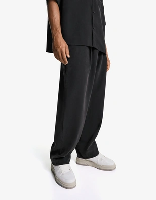 Брюки-джоггеры свободного кроя- Заказать в России