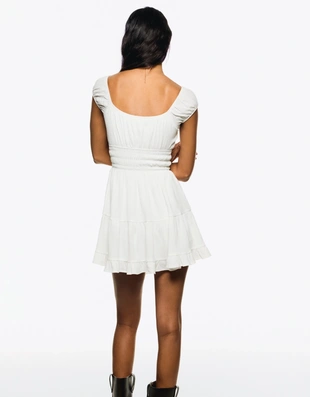 Мини-платье с воланами- Заказать в России