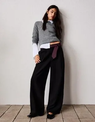 Брюки объемного кроя из двухслойной ткани- Заказать в России