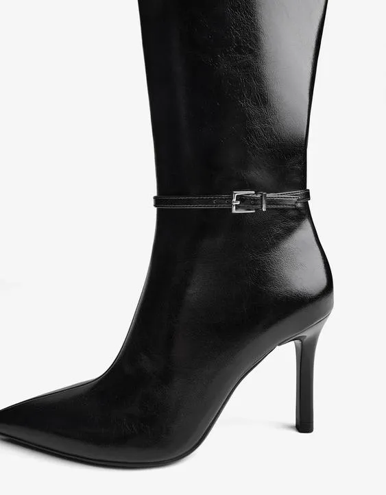 Heeled boots with buckle detail