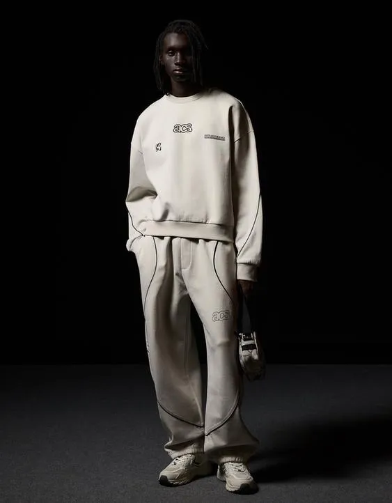 Брюки-бананы из ткани с принтом- Заказать в России