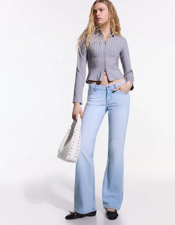 Расклешенные джинсы с низкой посадкой- Заказать в России