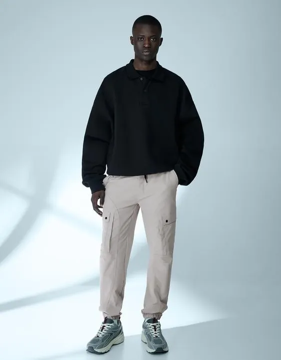 Зауженные брюки карго из высокотехнологичной ткани- Заказать в России