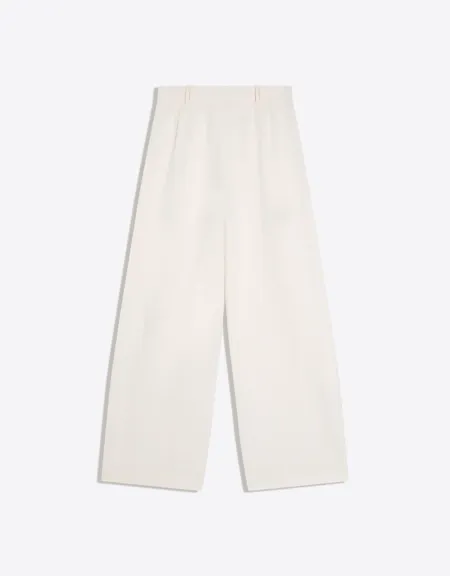 Брюки объемного кроя из двухслойной ткани- Заказать в России