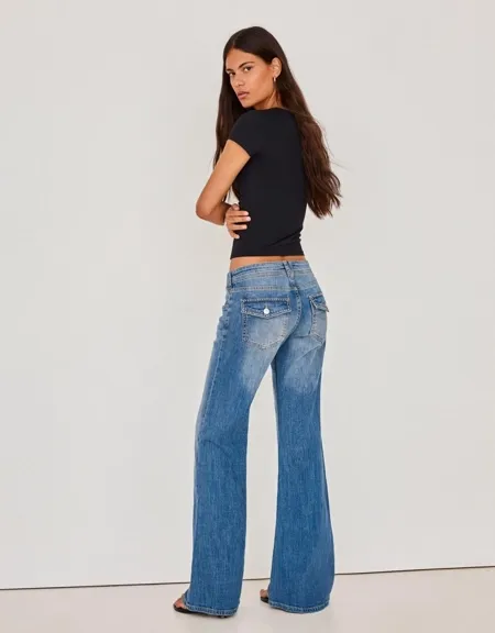Расклешенные джинсы с низкой посадкой- Заказать в России