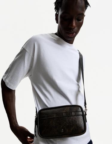 Distressed-effect crossbody bag