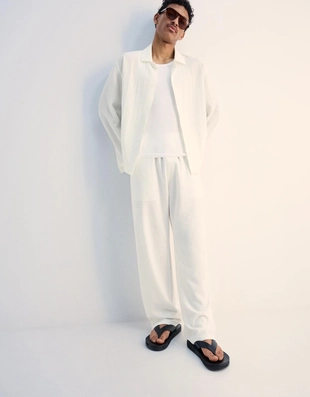 Джоггеры из смесового льна с широкими штанинами- Заказать в России