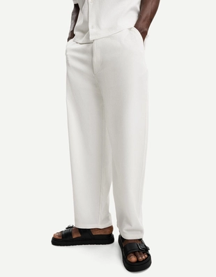 Джоггеры свободного кроя из плиссированной ткани- Заказать в России