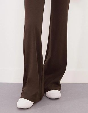 Расклешенные брюки- Заказать в России