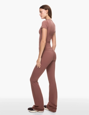 Высокотехнологичные брюки клеш- Заказать в России