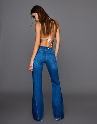 Джинсы клеш с контрастом- Заказать в России