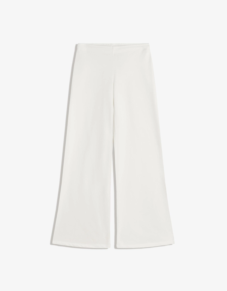 Брюки из мягкой ткани с декоративными заклепками