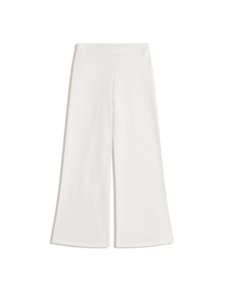 Брюки из мягкой ткани с декоративными заклепками