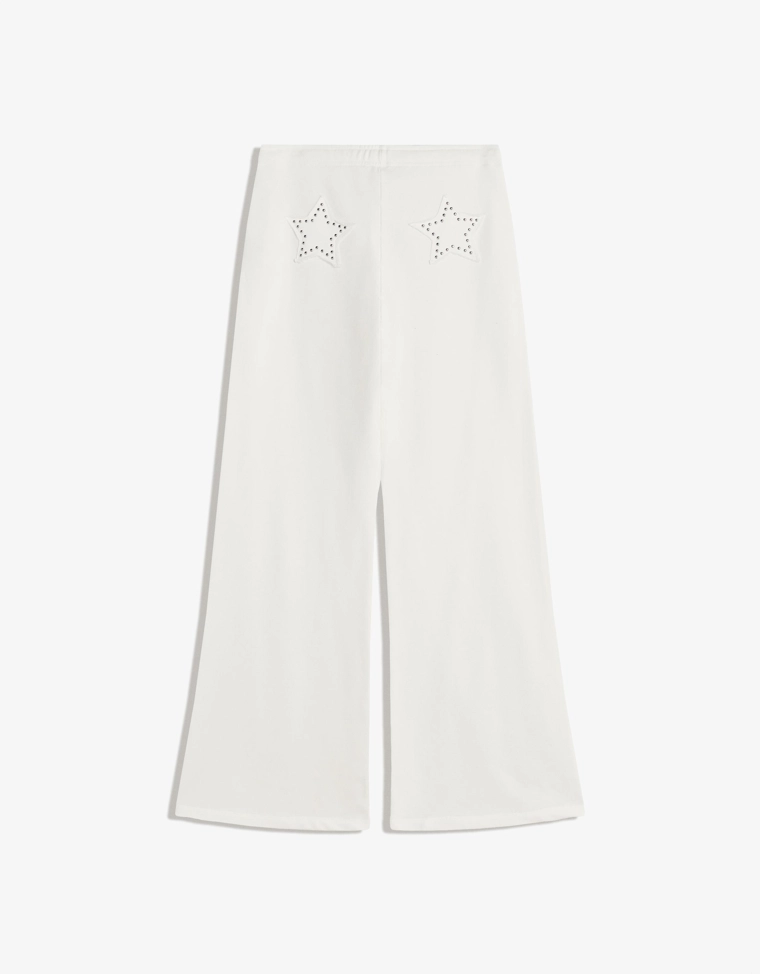 Брюки из мягкой ткани с декоративными заклепками