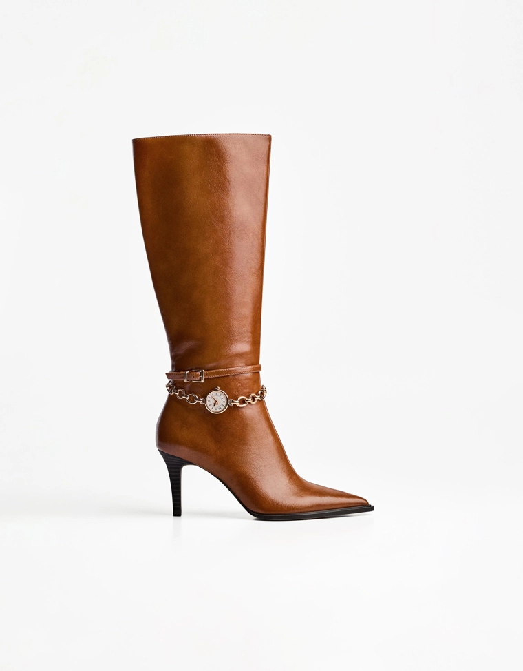 High-heel boots with watch detail