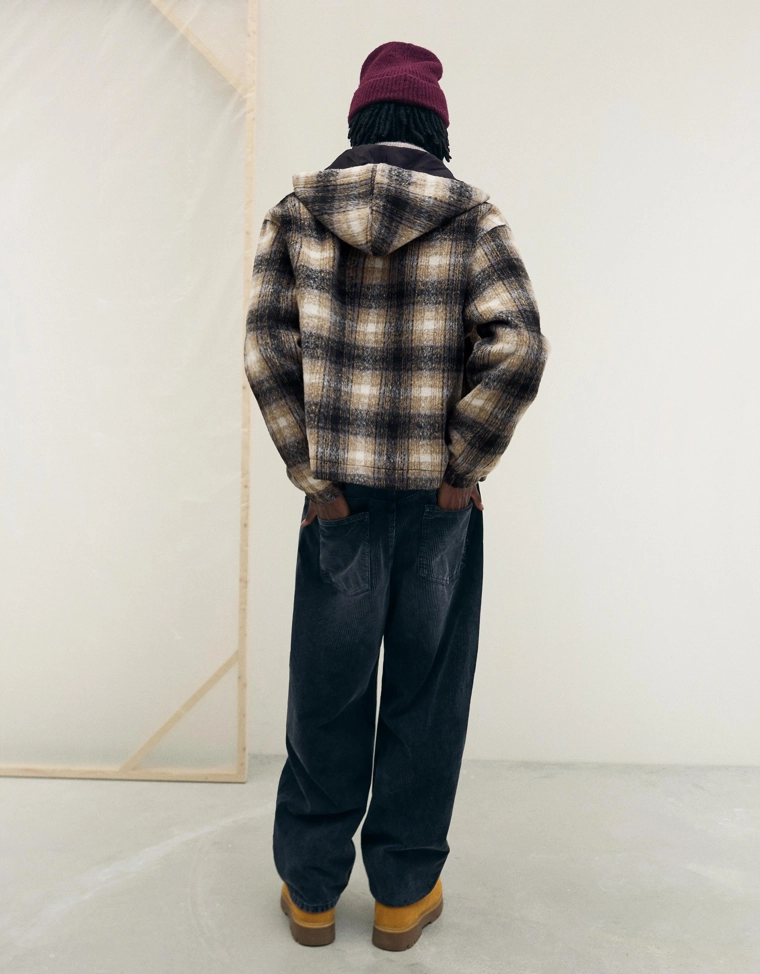 Куртка геометрического кроя в клетку с капюшоном