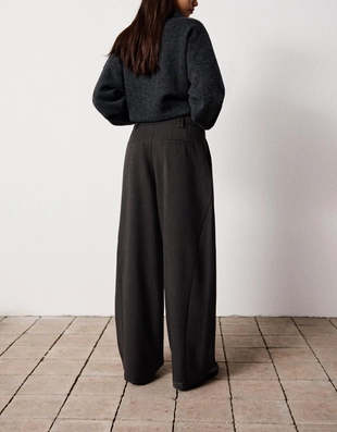 Брюки объемного кроя из двухслойной ткани- Заказать в России