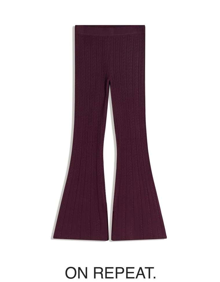 Расклешенные трикотажные брюки с узором «Косы»