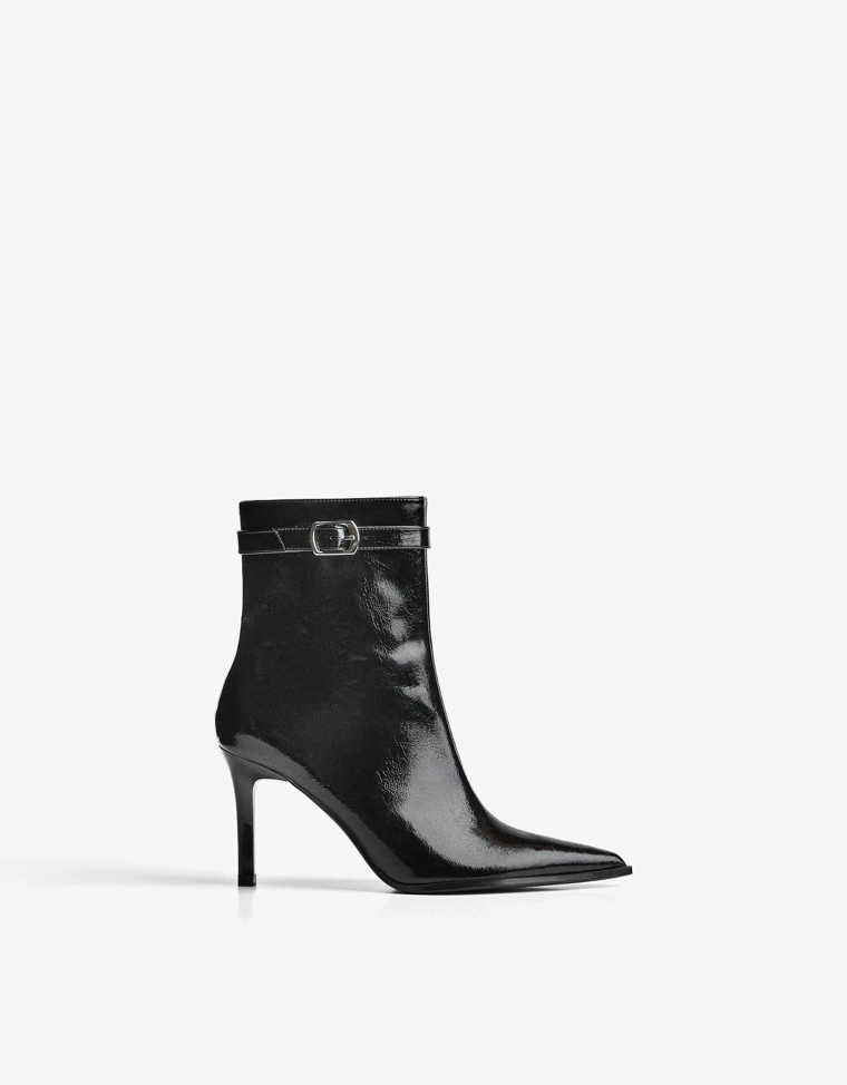 Heeled ankle boots with buckle strap