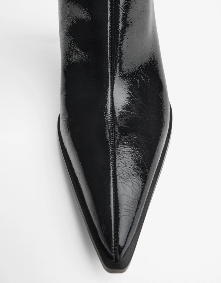 Heeled ankle boots with buckle strap