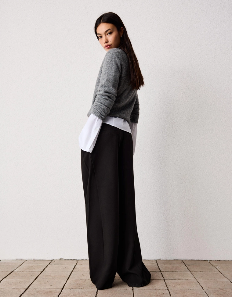 Брюки объемного кроя из двухслойной ткани