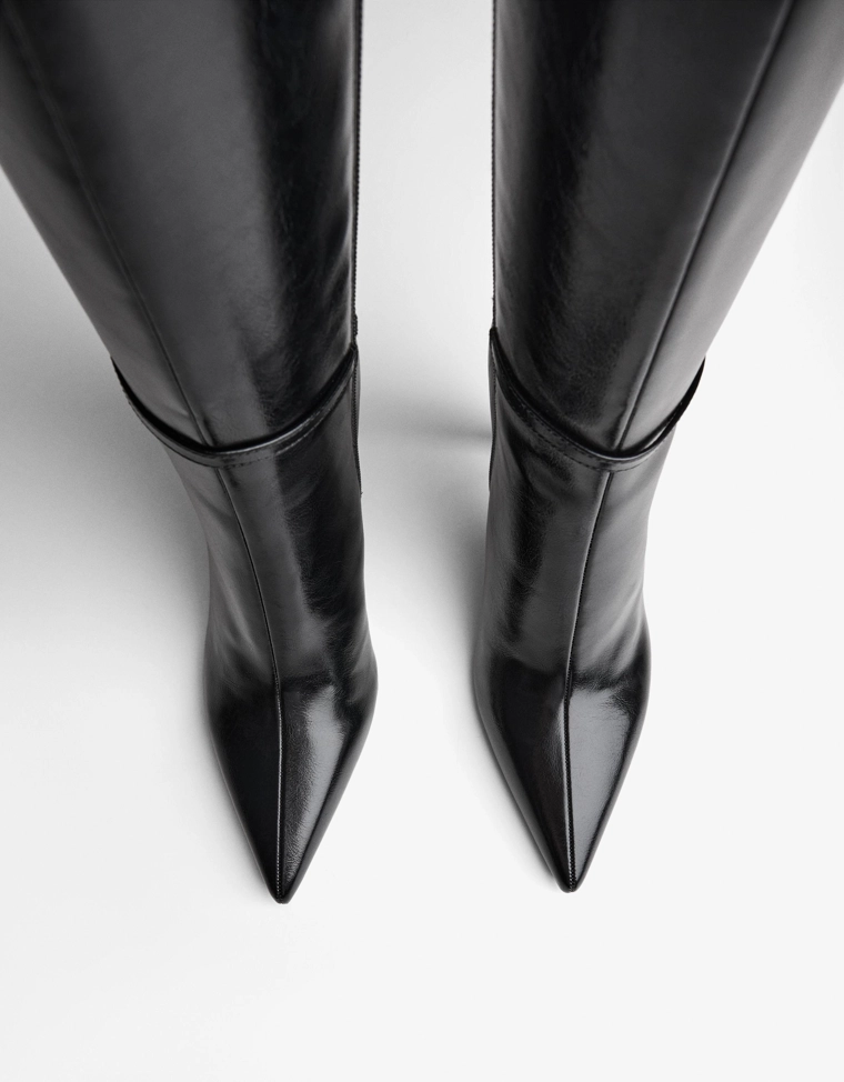 Heeled boots with buckle detail