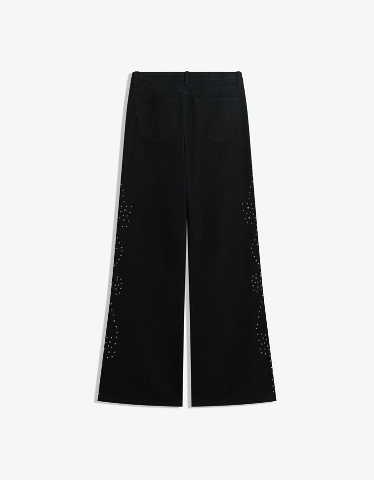 Джинсы свободного кроя с низкой посадкой и заклепками