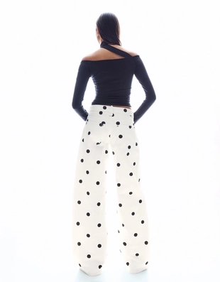 Брюки свободного кроя в горошек- Заказать в России