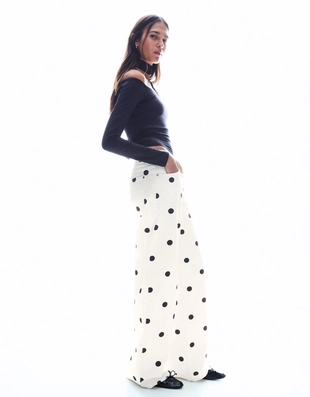 Брюки свободного кроя в горошек- Заказать в России