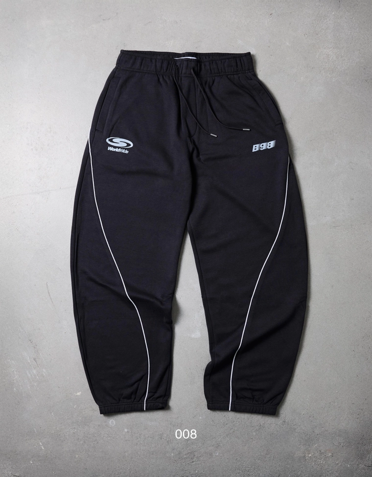 Брюки-бананы из ткани с принтом