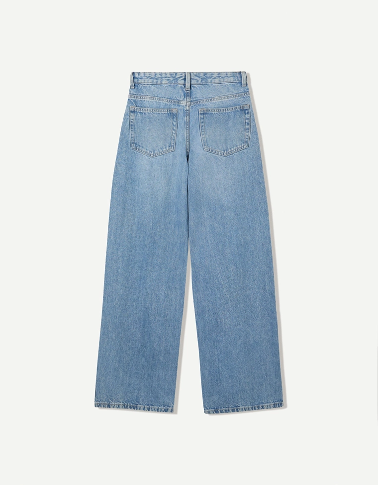 Джинсы с широкими штанинами и поясом на запахе