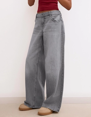 Джинсы с широкими штанинами и низкой посадкой- Заказать в России