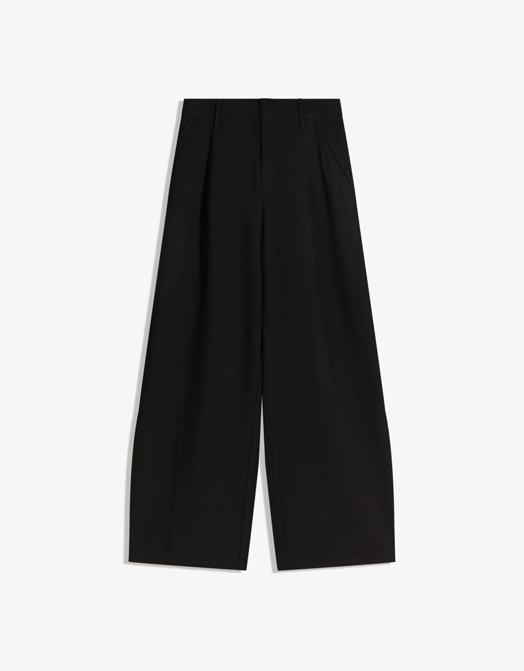 Брюки объемного кроя из двухслойной ткани