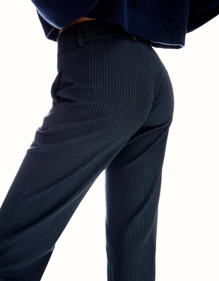 Расклешенные брюки с низкой посадкой- Заказать в России