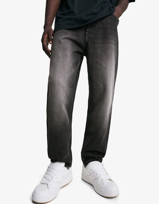 Джинсы свободного кроя, зауженные в нижней части- Заказать в России