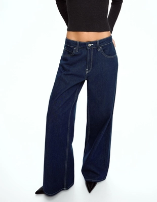 Джинсы с широкими штанинами- Заказать в России