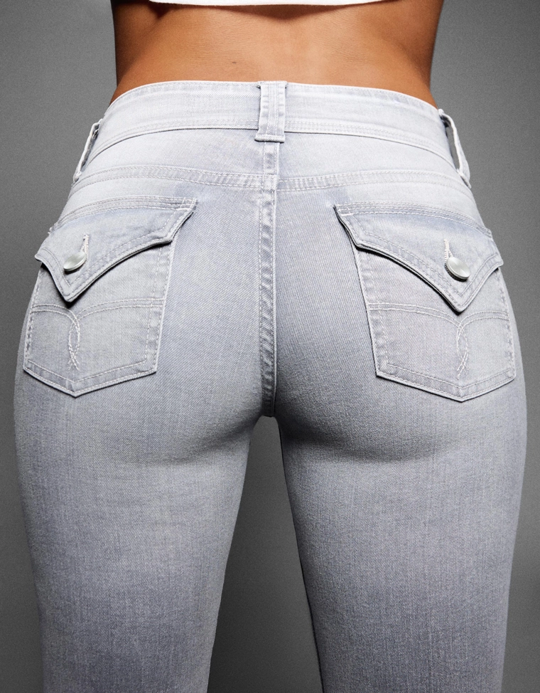 Джинсы bootcut с клапанами