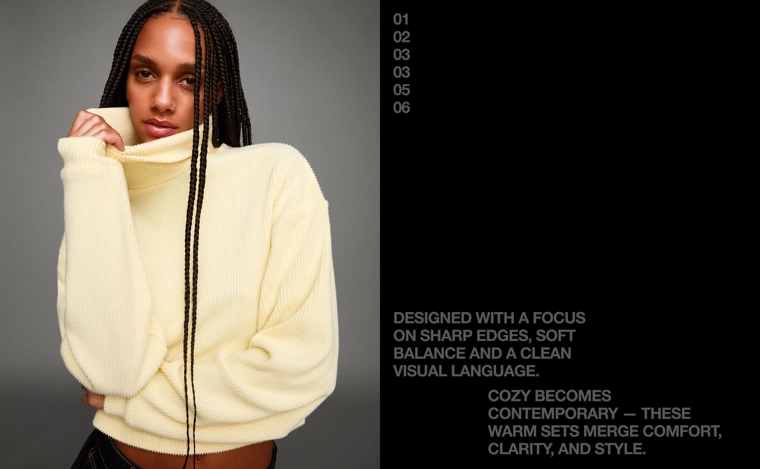 Свитер в рубчик с высоким воротником