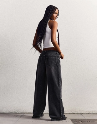 Джинсы с широкими штанинами и низкой посадкой- Заказать в России