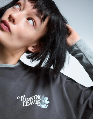 Футболка оверсайз с короткими рукавами и принтом- Заказать в России