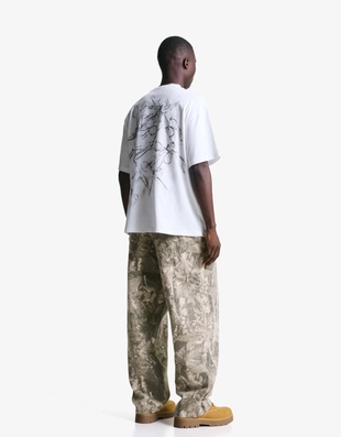 Брюки свободного кроя с принтом- Заказать в России