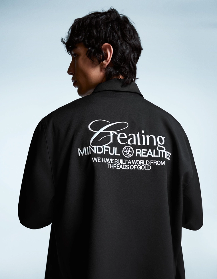 Рубашка геометрического кроя приталенная с вышивкой