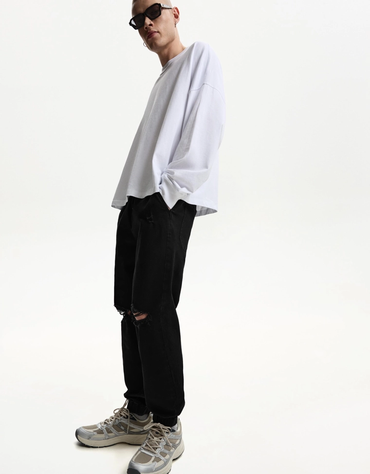 Джинсы джоггеры с разрезами