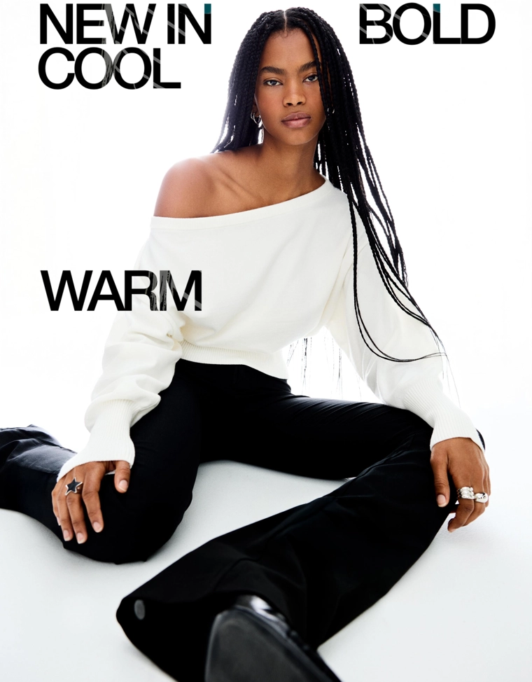 Асимметричный свитер с низом в рубчик