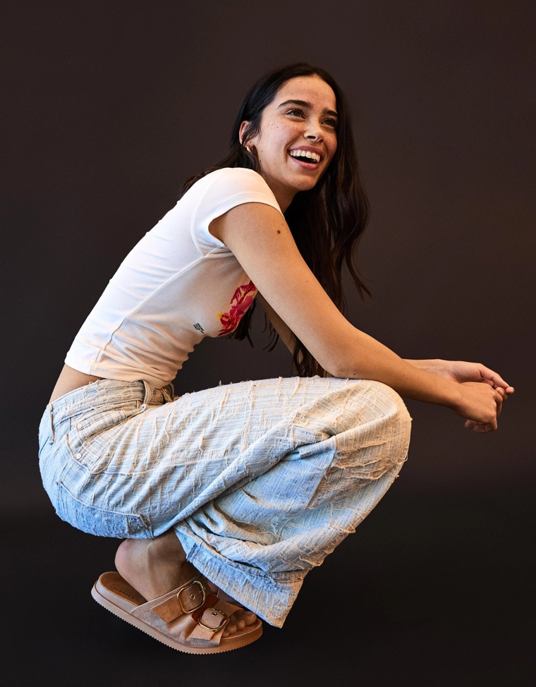 Кожаные босоножки на плоской подошве с пряжками