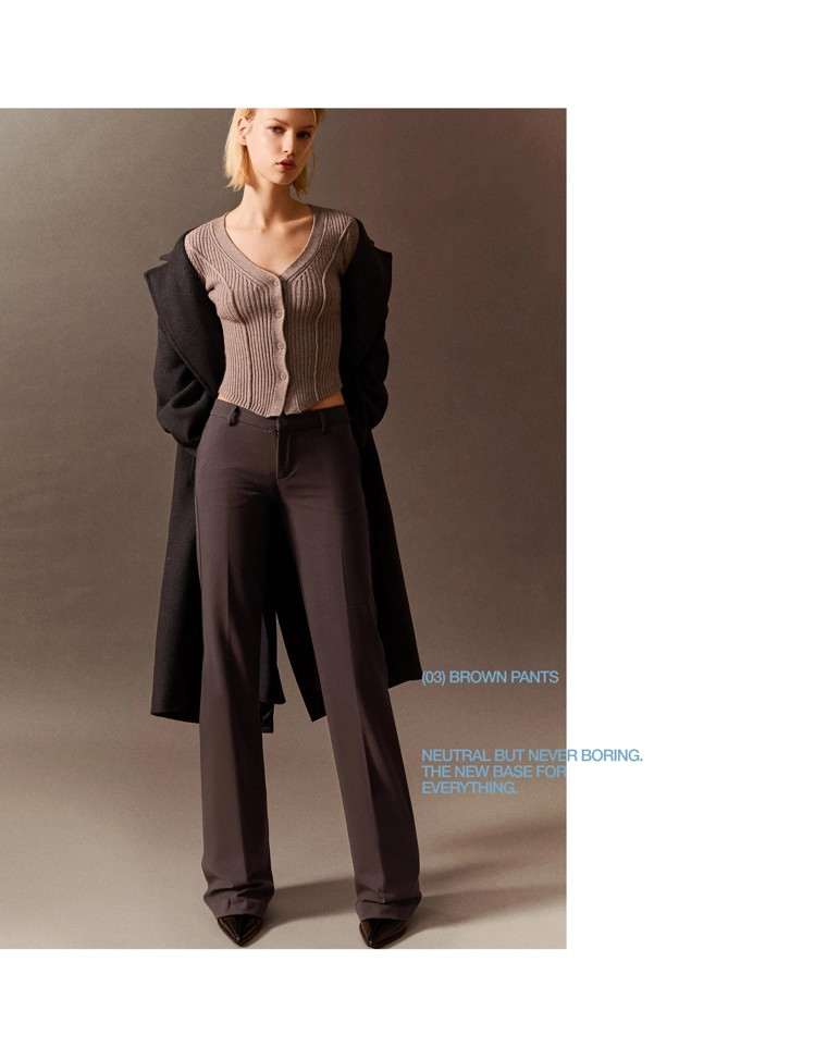 Брюки с низкой посадкой и расклешенными штанинами