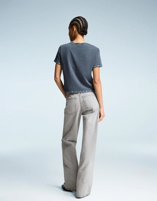 Джинсы с широкими штанинами и разрезами- Заказать в России